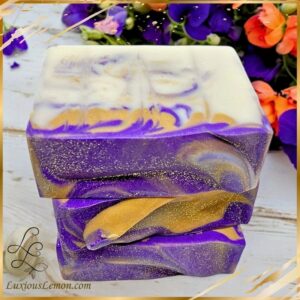 tack of cured Opium Violet Goat Milk Soap bars – artisan floral musk soap with a vintage-inspired scent, perfect for natural skincare routines.