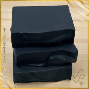 Luxious Lemon “Hello Gorgeous” Activated Charcoal Bar Soap — three dark matte soap bars stacked, handcrafted with activated charcoal for deep cleansing and detox.