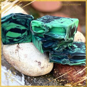 Handcrafted Eucalyptus Mint Activated Charcoal Bar Soap – artisanal cold-process soap with a swirled black and white design, infused with eucalyptus, peppermint, and spearmint essential oils.