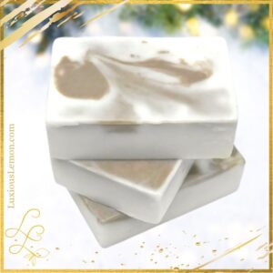 Stack of Fresh Start Goat’s Milk Bar Soaps featuring swirls of spice and citrus tones on a white background